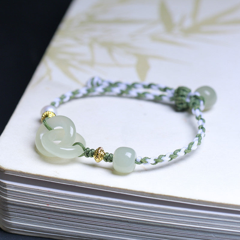 Adjustable Green & White Handwoven Bracelet with Interlocking Jade Peace Donuts, Luck & Harmony Jewelry for Women Main image