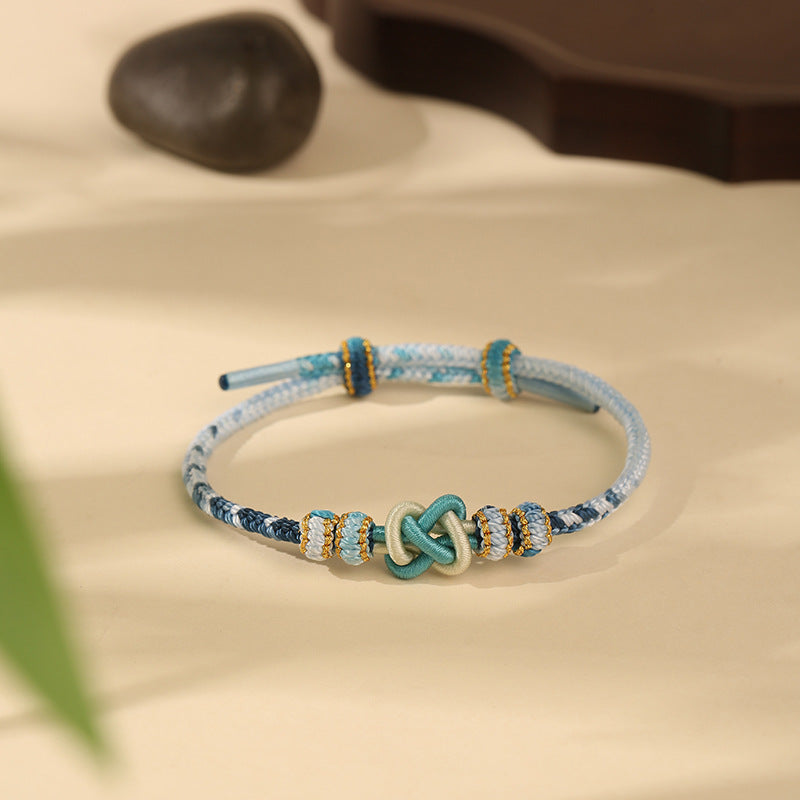Adjustable Blue & White Handwoven Bracelet with Traditional "Peace Knot", Luck & Protection Jewelry for Women Main image